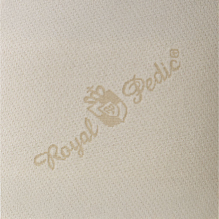 Close-up of the Royal Pedic logo and crown emblem on a textured, light-colored fabric.