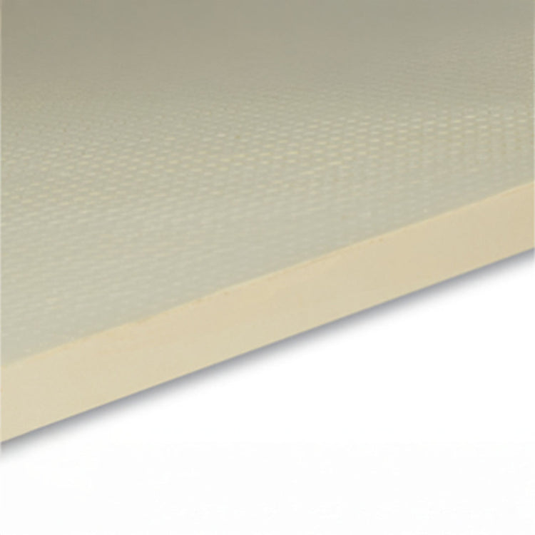 Close-up of a light beige mat with a subtle textured surface, showing its thickness and edge.