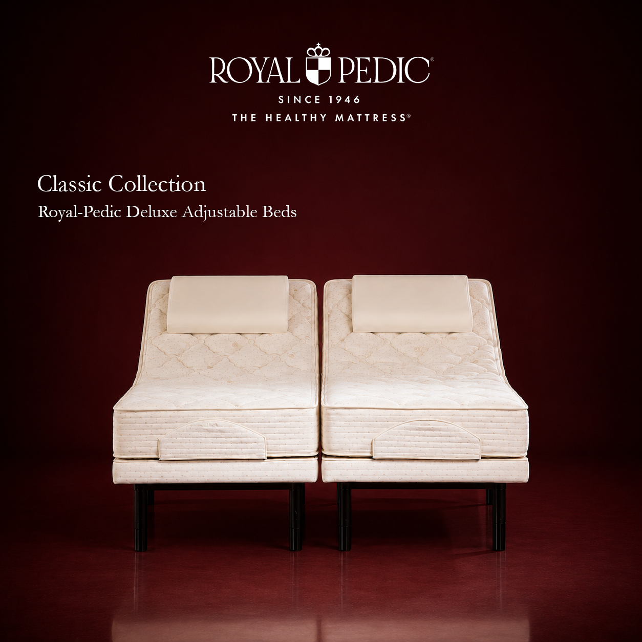 Royal-Pedic Deluxe Adjustable Bed set with two cream colored mattresses on black legs against a dark red background