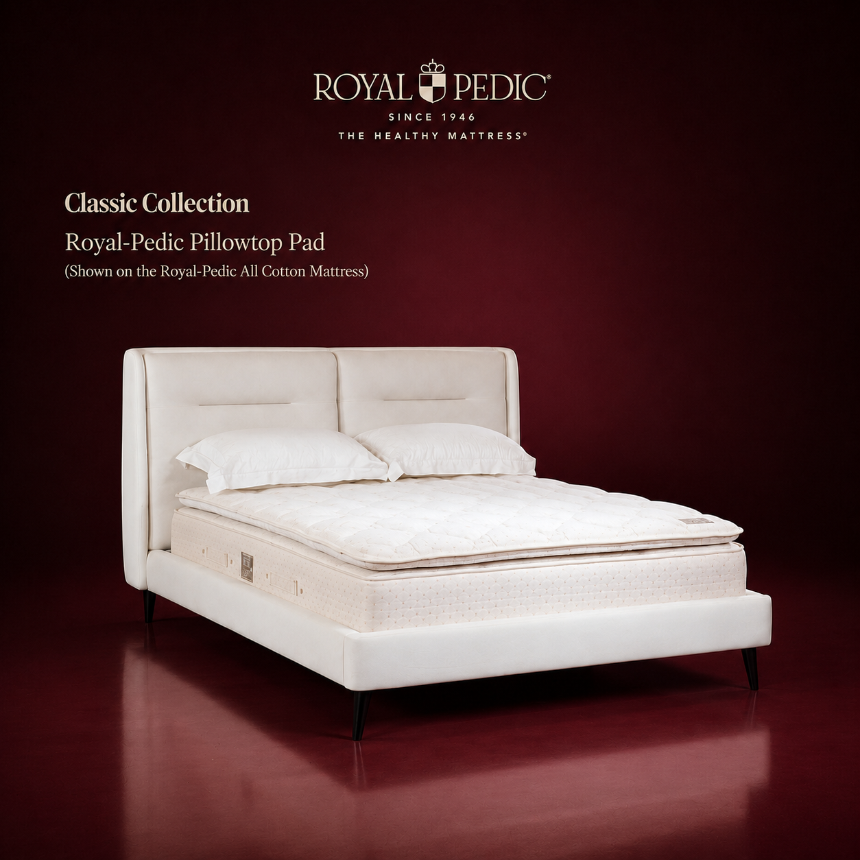 Royal-Pedic Classic Collection pillowtop pad on an all cotton mattress with white headboard and pillows against a dark red background