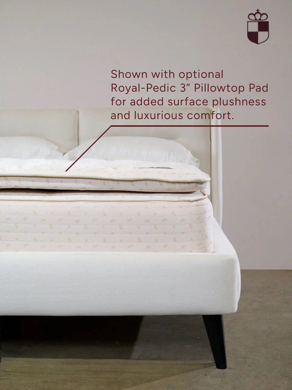 White mattress with text about optional Royal-Pedic 3" Pillowtop Pad on a neutral background